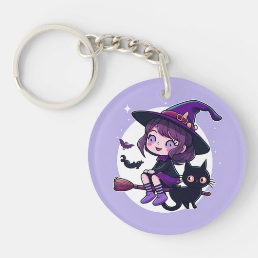 Kute heks met een zwarte kattenbak | sleutelhanger (Voorkant)