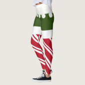 Kute kerstkerstmis met blauw snoepriet met witte d leggings (Links)