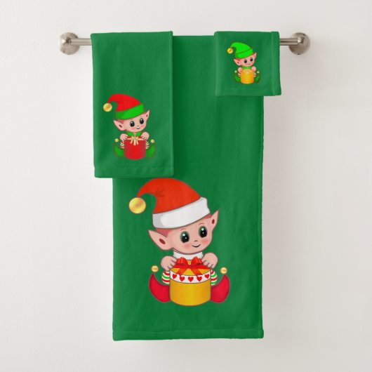 Kute kerstkleppen op groen bad handdoek (Insitu)