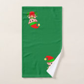 Kute kerstkleppen op groen bad handdoek (Handdoek)