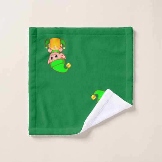 Kute kerstkleppen op groen bad handdoek (Wasdoekje)