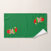 Kute kerstkleppen op groen bad handdoek (Handdoek)