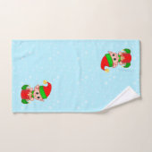 Kute kerstkleppen op lichtblauw bad handdoek (Handdoek)