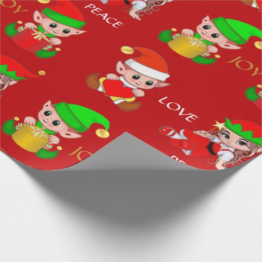 Kute kerstkleppen op rood cadeaupapier (Hoek)