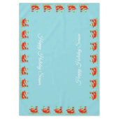 Kute kerstkleppen op slee in lichtblauw tafelkleed (Voorkant)