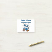 Kute kerstkoekjes en cacaoblauwe gnomen post-it® notes (Op bureau)