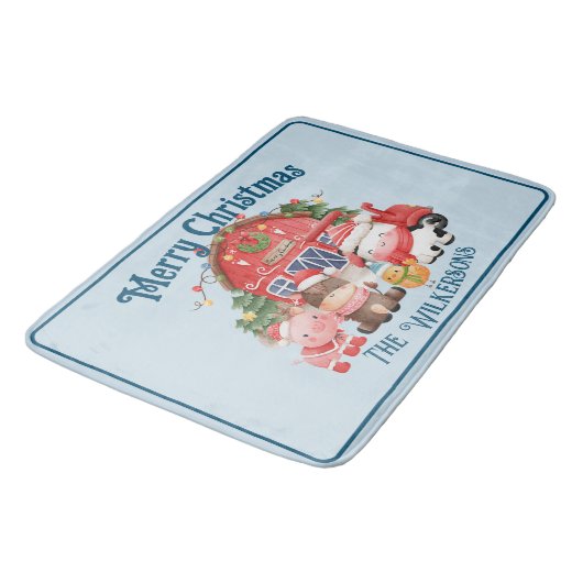 Kute kerstvee op lichtblauw blauw badmat (Gekanteld)