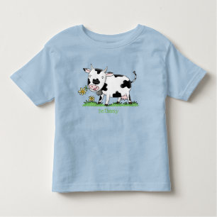 Kute koe in de illustratie van de groene cartoon kinder shirts