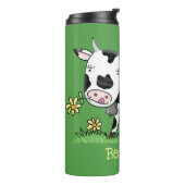 Kute koe in de illustratie van de groene cartoon thermosbeker (Gedraaid links)