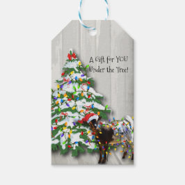 Kute Little Goat heeft de kerstboom gedecorreerd Cadeaulabel