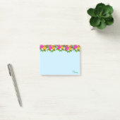 Kute meerkleurige bloemen op lichtblauw post-it® notes (Kantoor)