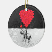 Kute olifant en liefdeshart op grijs keramisch ornament (Links)