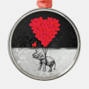 Kute olifant en liefdeshart op grijs metalen ornament