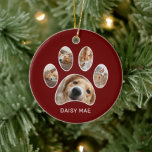 Kute Paw Print Pet Naam Jaar Foto Collage Rood Keramisch Ornament<br><div class="desc">Show je liefde voor je huisdier met dit schattige en eenvoudige aangepaste fotocollage-ontwerp met de naam van je huisdier,  samen met vijf foto's van je huisdier in een pootdruk die in het wit op een rode achtergrond wordt geschetst.</div>