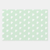 Kute roze blauwe groene harten die papierbladen ov inpakpapier vel (Voorkant 2)