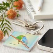 Kute zoissende draaistellen - acryl op pastelachte sleutelhanger (Voorkant Rechts)