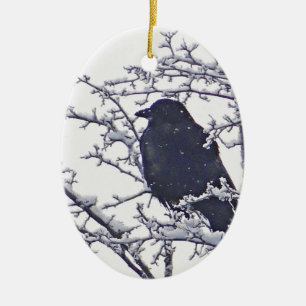 Kute zwarte vogel in sneeuwtakken keramisch ornament