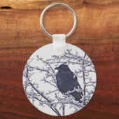 Kute zwarte vogel in sneeuwtakken sleutelhanger (Voorkant)