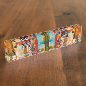 Kutkleurig abstract schilderij werpt kussen op naambordje (Zijkant)