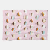 Kutkopjes koffie op lichtroze theedoek (Horizontaal)