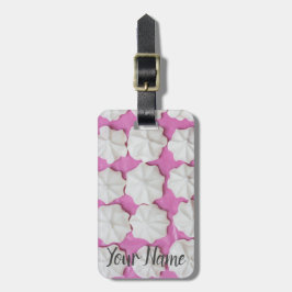 Kwalies op roze papieren cadeau bagagelabel