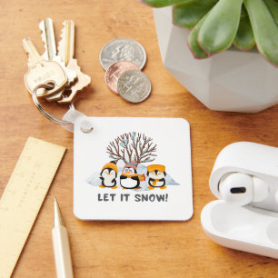Laat het pinguïns sneeuwen sleutelhanger