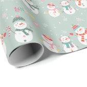 Laat het sneeuwsneeuwmannen op groen cadeaupapier (Rol Hoek)