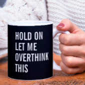 Laat me dit overdenken. koffiemok