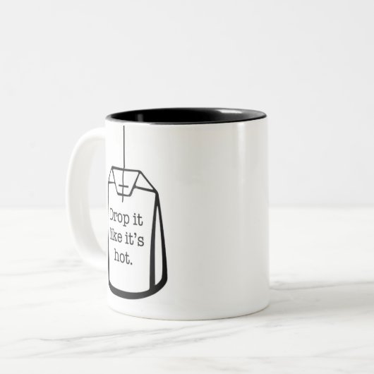 Laat vallen alsof het heet is tweekleurige koffiemok (Voorkant links)