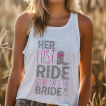 Laatste rit Bachelorette Tanktop<br><div class="desc">Ja! Maak je klaar voor de laatste rodeo van de bruid met deze leuke en flirterige tanktop met een landelijk thema. "Her Last Ride" is de perfecte slogan voor een vrijgezellenfeest vol lach, herinneringen en misschien een beetje onheil. Deze comfortabele en stijlvolle tank is ideaal voor een dagje uit in...</div>