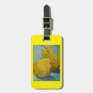Label met gele peren op blauw bagagelabel