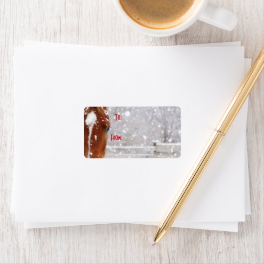 Label met kerstcadeaus voor winterpaarden (Insitu)