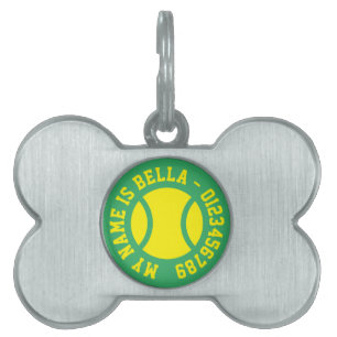 Label van de metalen bothond met tennisbal logo huisdieren naamplaatje