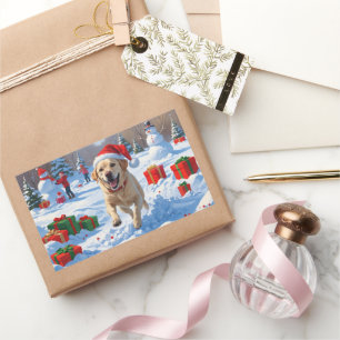 Labrador-hond rent in de sneeuw met kerstmuts rechthoekige sticker