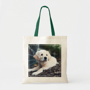 Labrador puppy play in de tuin tote bag