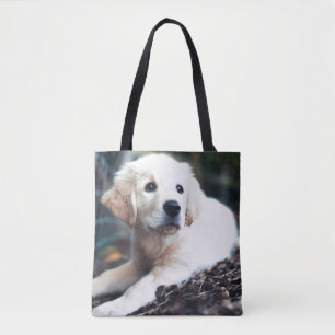 Labrador puppy play in de tuin tote bag