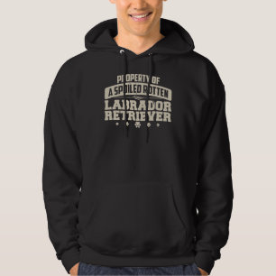 Labrador Retriever eigendom van een verwende rotte Hoodie