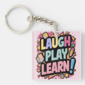 Lach, Speel, Leer roze Sleutelhanger (voorkant)