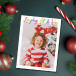 Lachend helemaal regenboog Kinder Kerstmis Foto Feestdagenkaart<br><div class="desc">Mooie,  kleurrijke volledige foto Kerst briefkaart met Lachen All the Way in  regenboog cursief script. Personaliseer met uw favoriete verticale familiefoto van uw glimlachend kind boven jouw naam of aangepaste begroeting in rood. Leuke en vrolijke vakantie briefkaarten.</div>