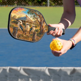 Lachvogels bij zonsondergang op prikkeldraadafslui pickleball paddle