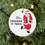 Lacrosse kerstcadeaus keramisch ornament<br><div class="desc">Het originele lacrosse "Checking It Twice" kerstontwerp voor uw favoriete laxspeler,  coach of teamsportfan.</div>