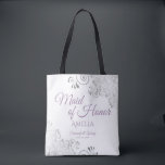 Lacy Silver & Lavender Maid of Honor White Wedding Tote Bag<br><div class="desc">Deze mooie canvas tas is ontworpen als een cadeau, een gunst of een zwembad voor je bruiloft Maid of Honor. Het eenvoudige maar elegante ontwerp kenmerkt zilveren grijze frills in de hoeken met fancy lavender paarse manuscriptletters. Er is ruimte voor haar naam, evenals de namen van het paar en de...</div>