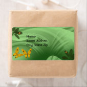 Lady bugs en vlinders in het groen etiket (Insitu)