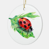 Ladybug op een groen lef keramisch ornament (Links)