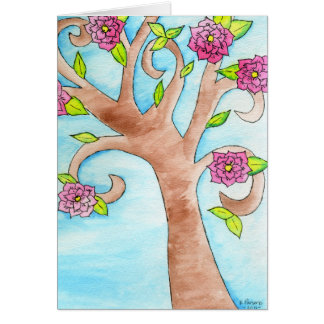 Lage boom met roze bloemen