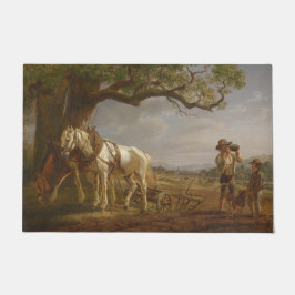 Landbouwers die in een veld met paarden en ploegen deurmat