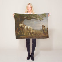 Landbouwers die in een veld met paarden en ploegen