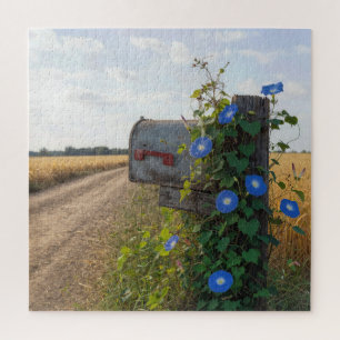Landelijke brievenbus met ochtendglorie legpuzzel