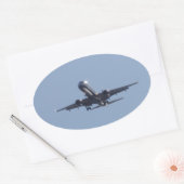 Landen in de zon ovale sticker (Envelop)
