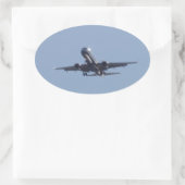 Landen in de zon ovale sticker (Tas)